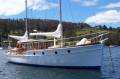 Ketch rigged auxilliary motor yacht.