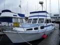 Steel flybridge cruiser.