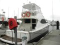 Riviera 42 Platinum twin helm flybridge cruiser.